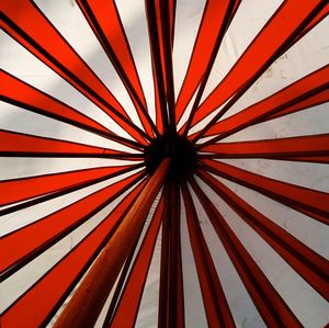 Low angle view of red umbrella