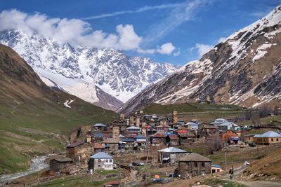 Scenic view of snowcapped mountains against sky