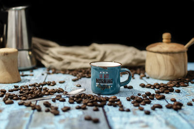 Close-up of coffee beans on table