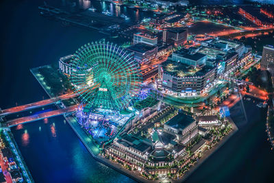 High angle view of illuminated cityscape at night