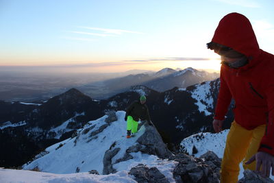 Teenage boy on mountain peak