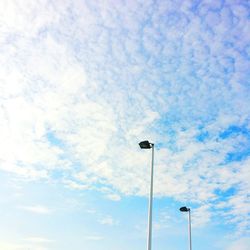 Low angle view of street light against sky