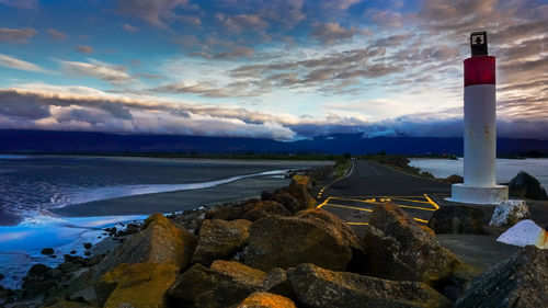 Scenic view of sea against cloudy sky