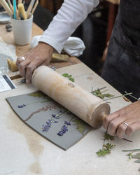 High angle view of person working on table