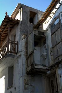 Low angle view of built structure against blue sky