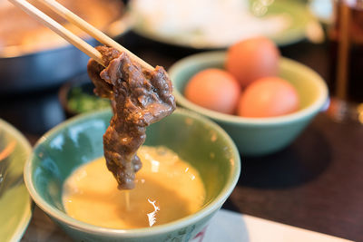 Close-up of soup in bowl on table