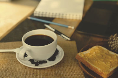 Close-up of coffee served on table