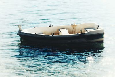 Boats moored in sea