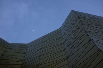 Low angle view of modern building against clear sky