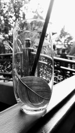 Close-up of glass window on table