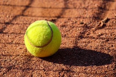 Close-up of green ball on table