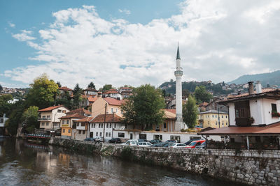 River by city against sky