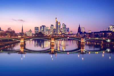 Illuminated buildings in water