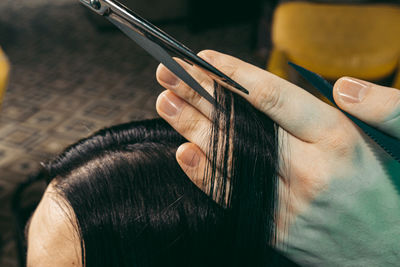 Cropped image of man using mobile phone