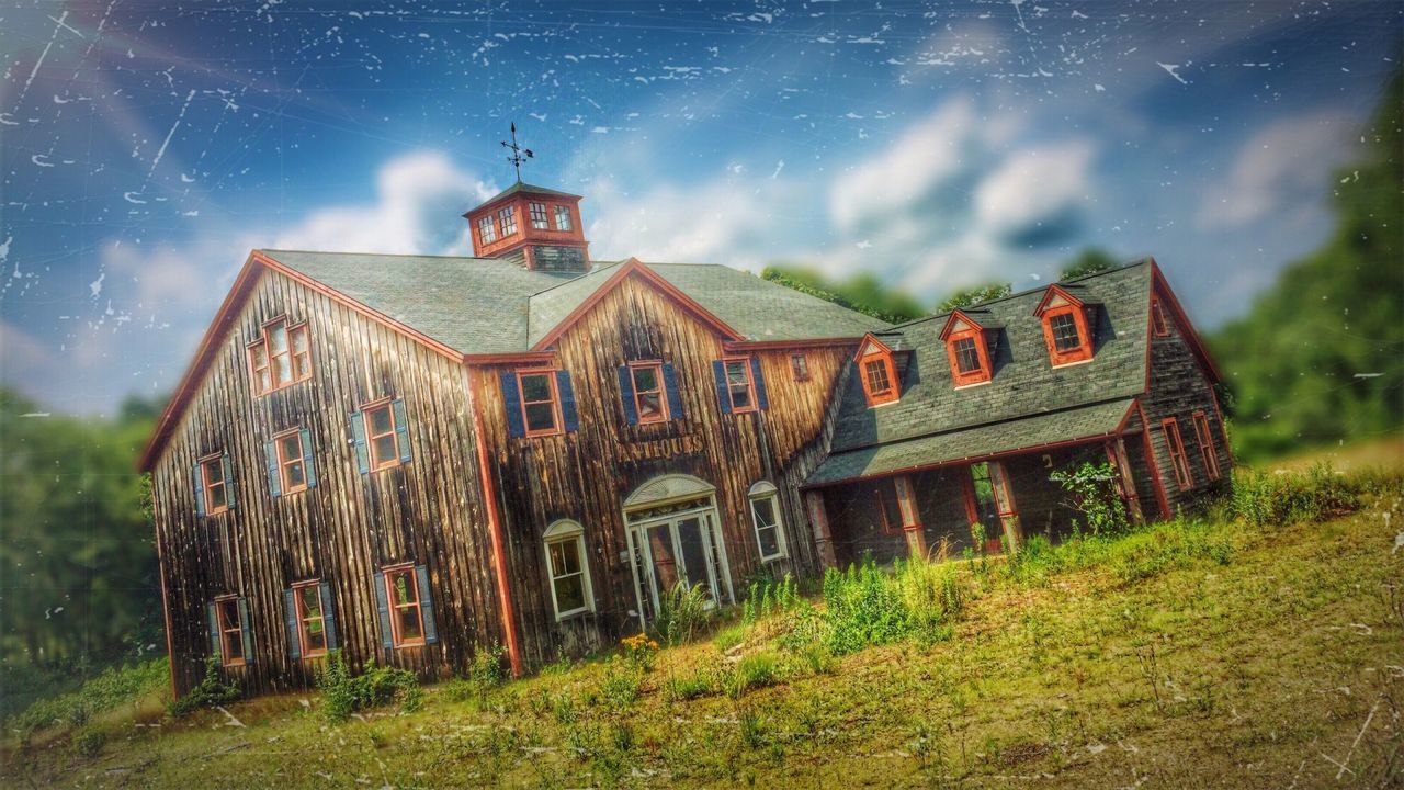 architecture, building exterior, built structure, sky, place of worship, church, religion, cloud - sky, house, grass, spirituality, field, old, barn, outdoors, cloudy, nature, no people