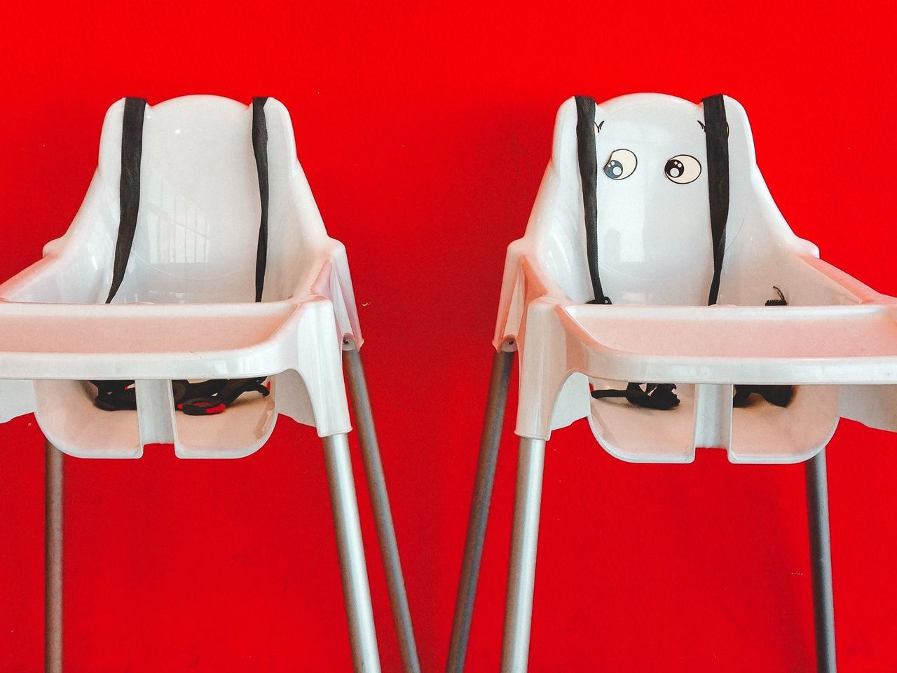 red, indoors, white color, close-up, white, human representation, still life, no people, copy space, studio shot, art and craft, in a row, absence, art, day, creativity, footwear, wall - building feature