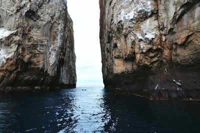 Scenic view of rock formation in sea at galapagos islands