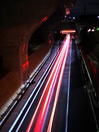 Light trails on road in tunnel