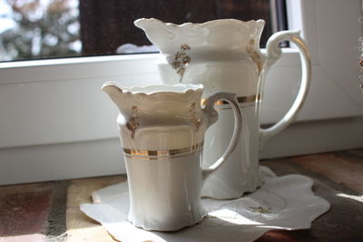 Close-up of coffee cup on table