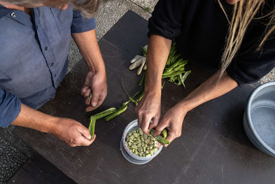 Midsection of man preparing food