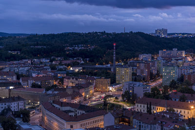 High angle view of illuminated buildings in city against sky