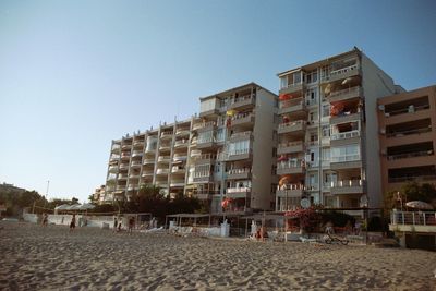 View of buildings against clear sky