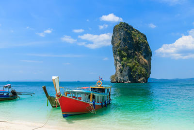 Rang islands and logn tail boat at ao phra nang near railay beach, krabi, thailand