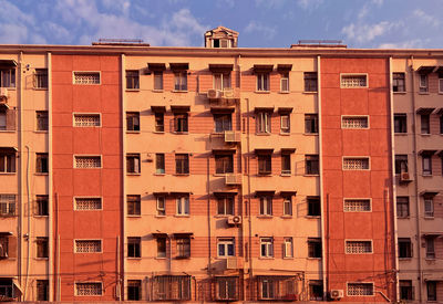 Low angle view of building sunset on the building