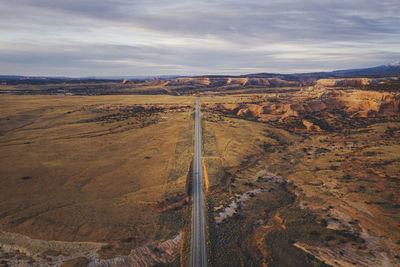 Lonely utah's road in the evening from above