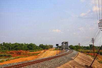 Railroad tracks against sky