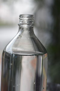 Close-up of water bottle on table