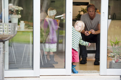 Father with children at home