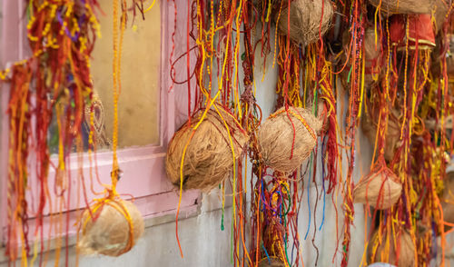 Close-up of decorations hanging for sale