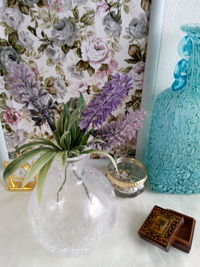 Close-up of flower vase on table