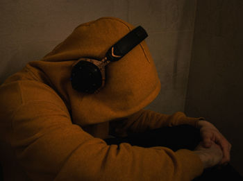 Portrait of man lying down on sunglasses