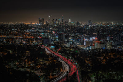 High angle view of illuminated cityscape at night