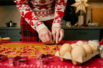 Midsection of woman preparing food