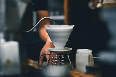 Close-up of coffee cup on table