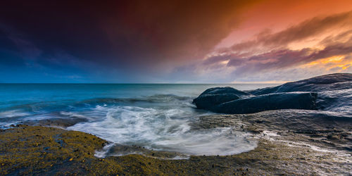 Scenic view of sea against sky during sunset