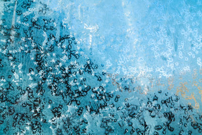 Full frame shot of ice floating on swimming pool