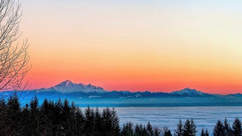 Scenic view of mt baker against sky during sunset