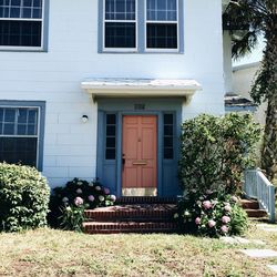 Building with flowers in foreground