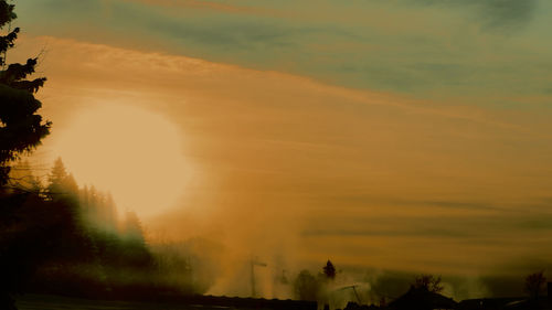 Scenic view of silhouette landscape against sky during sunset