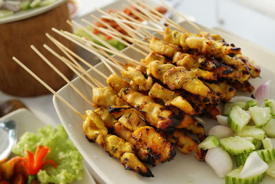 High angle view of satay served in plate