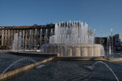 Fountain in milano city in a clear sky day