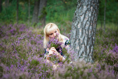 Beautiful woman looking away at lavender field