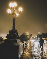 Illuminated water at night