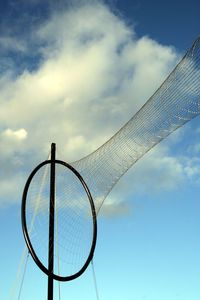 Low angle view of windsock against sky