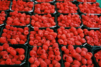 Full frame shot of raspberries for sale at market