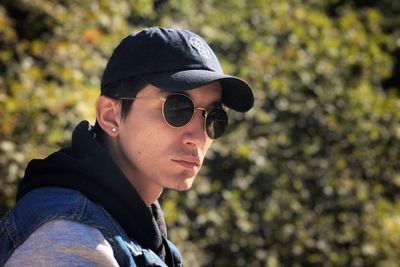 Portrait of young man wearing sunglasses